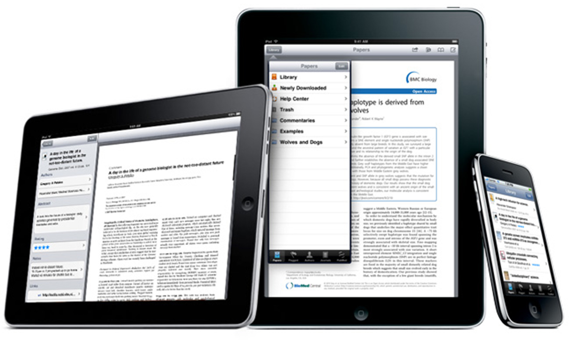 A photo showing two iPads and an iPhone. One iPad is horizontal, and one is vertical. The iPhone is on the right, leaning against the vertical iPad.